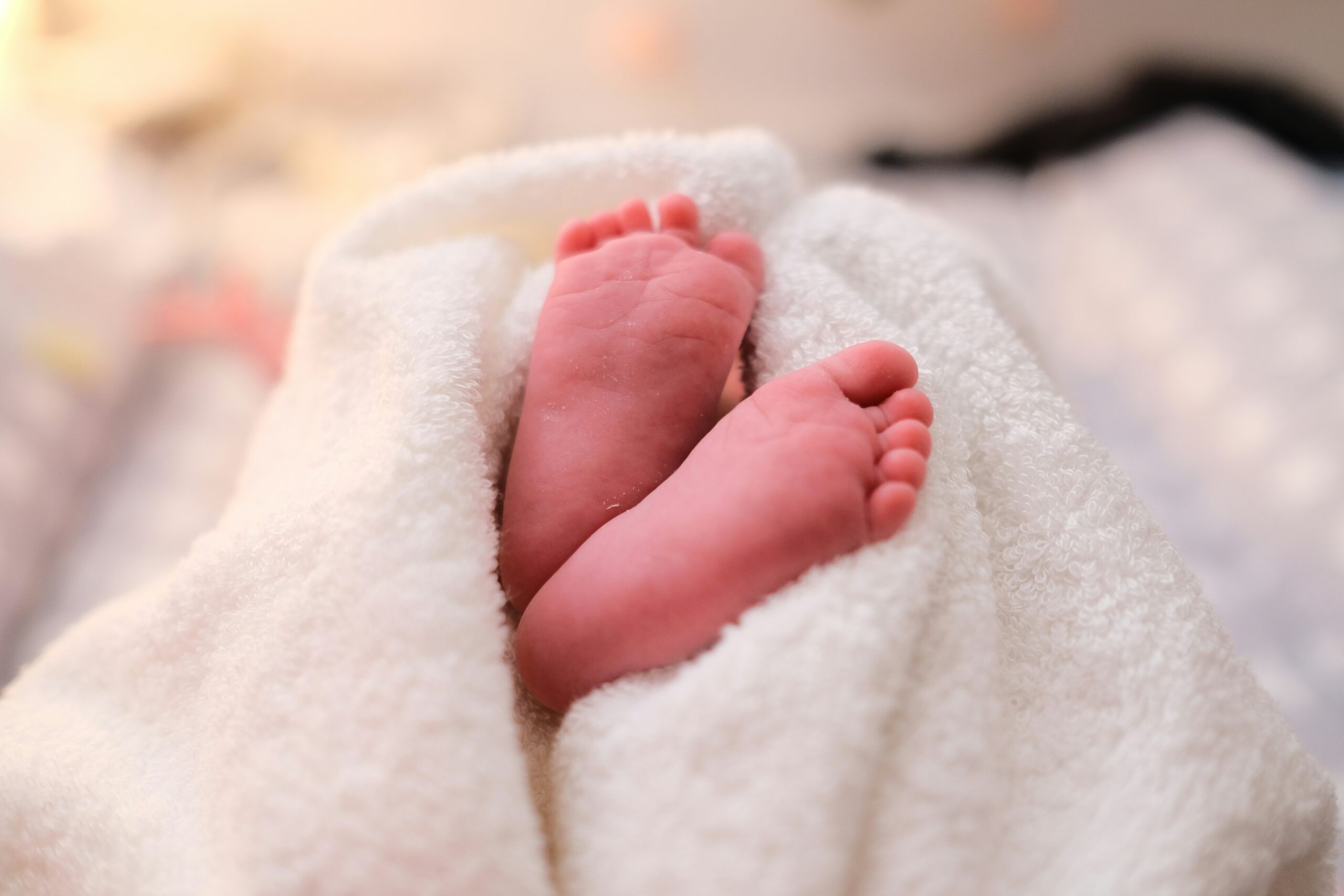 baby feet wrapped in a blanket