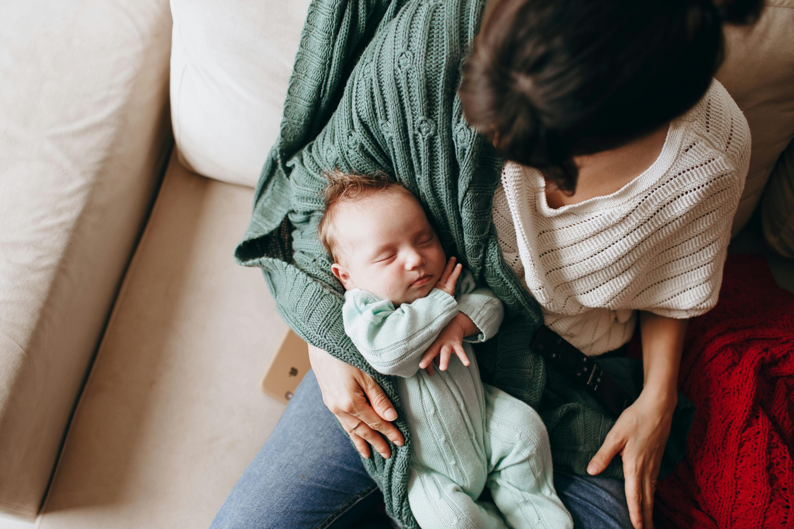 mother holding newborn